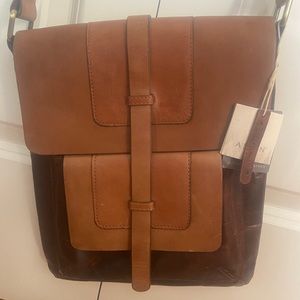 NWT!! Genuine leather messenger style bag with adjustable straps
